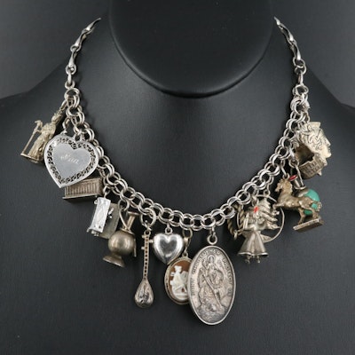 Mixed Silver Charm Necklace Including Glass, Shell and Enamel Accents