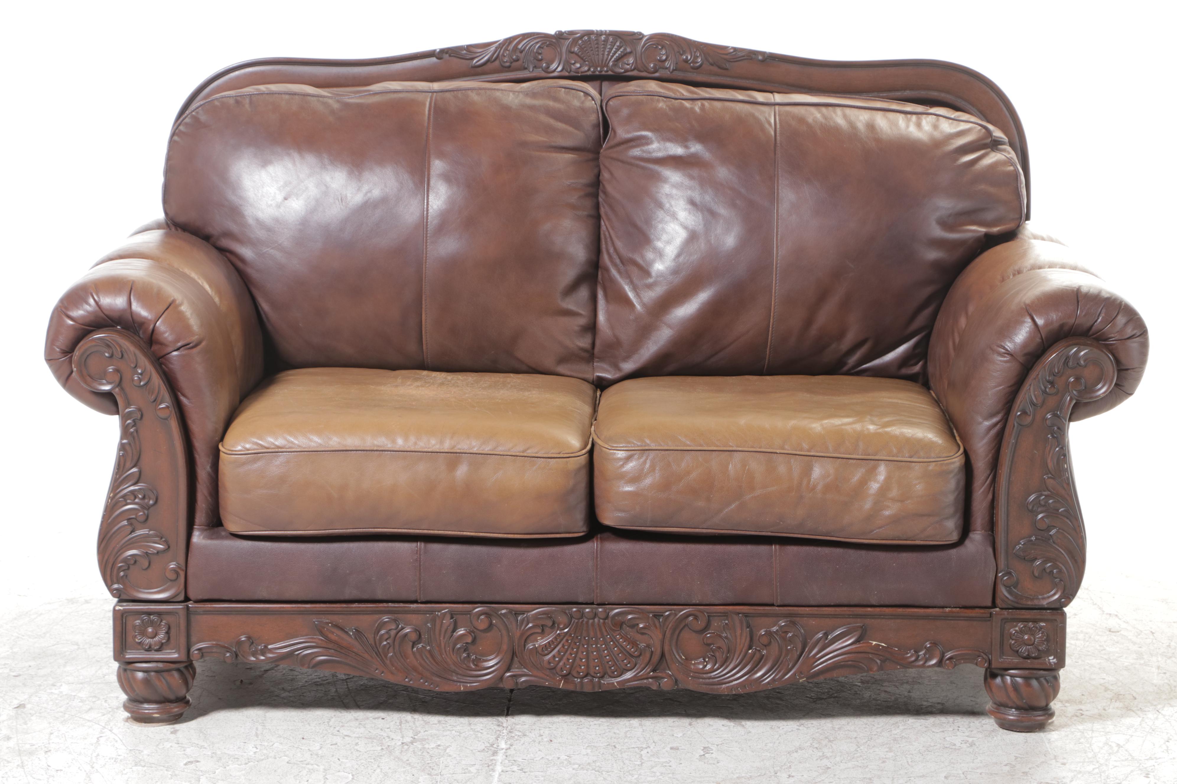 Ashley Furniture Leather-Upholstered Loveseat Sofa | EBTH