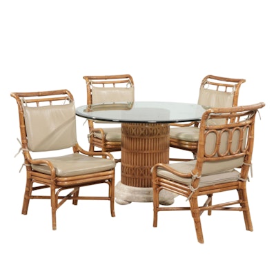 Rattan and Glass Top Dining Table and Four Chairs