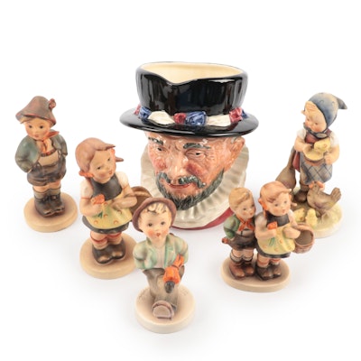Royal Doulton "Beefeater" Character Jug with Goebel Hummel Figurines