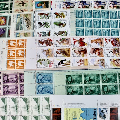 Twenty-Two Various Denominations of U.S. Postage Stamp Sheets