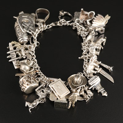 Vintage Sterling Charm Bracelet Including 800 Silver and Articulated Charms