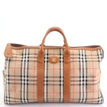 Burberrys Duffle Bag in "Haymarket Check" Canvas and Grained Leather