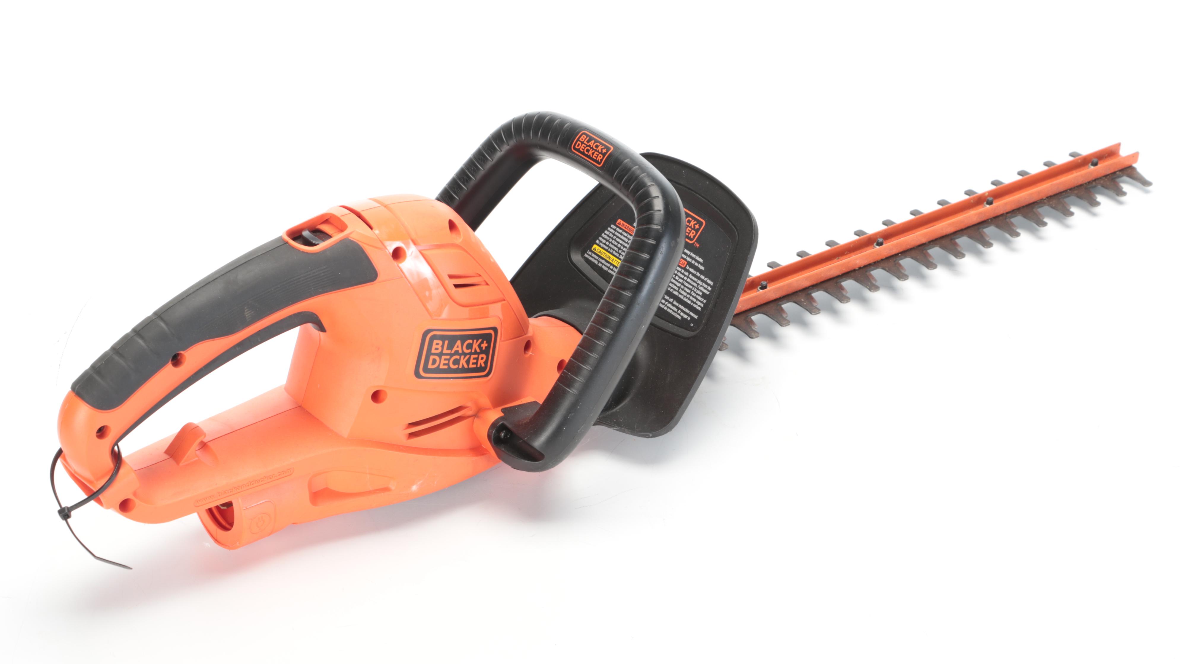 STIHL GasPowered Chain Saw With Black + Decker Electric Hedge Trimmer