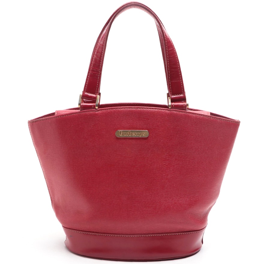 Burberrys Top Handle Handbag in Red Cross Grain Textured and Patent Leather