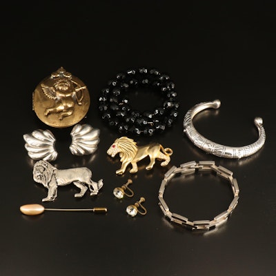 Rhinestones, Cherub Locket and Lions Featured in Jewelry Collection