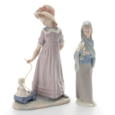 Lladró "Pulling Doll's Wagon" and "Girl with Flowers" Porcelain Figurines