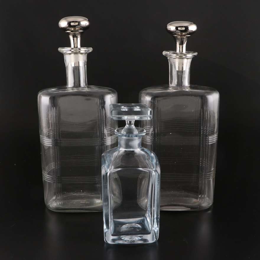 Pair of Etched Crystal Decanters with Silver and Glass Tone Stoppers