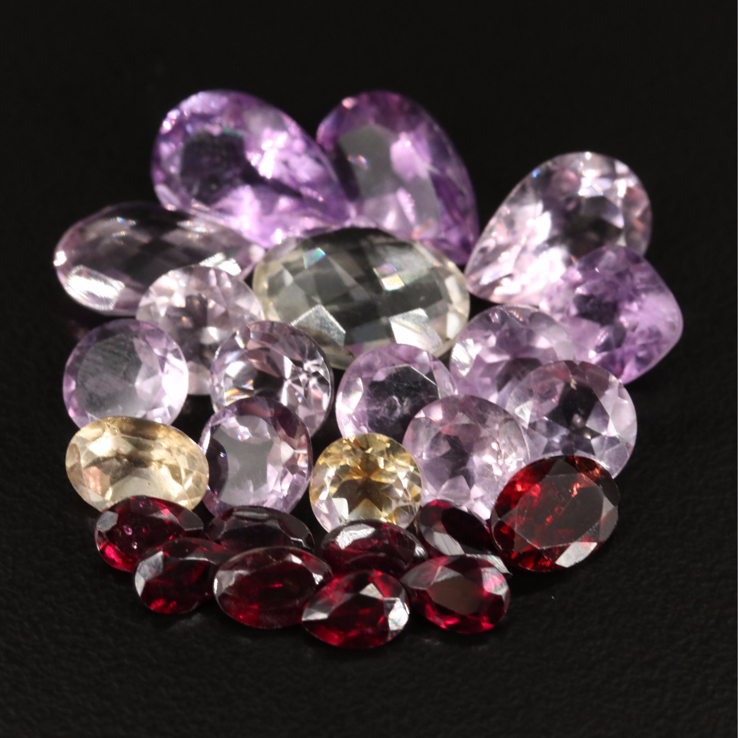 Loose 33.75 CTW Amethyst, Citrine, and Garnet Lot