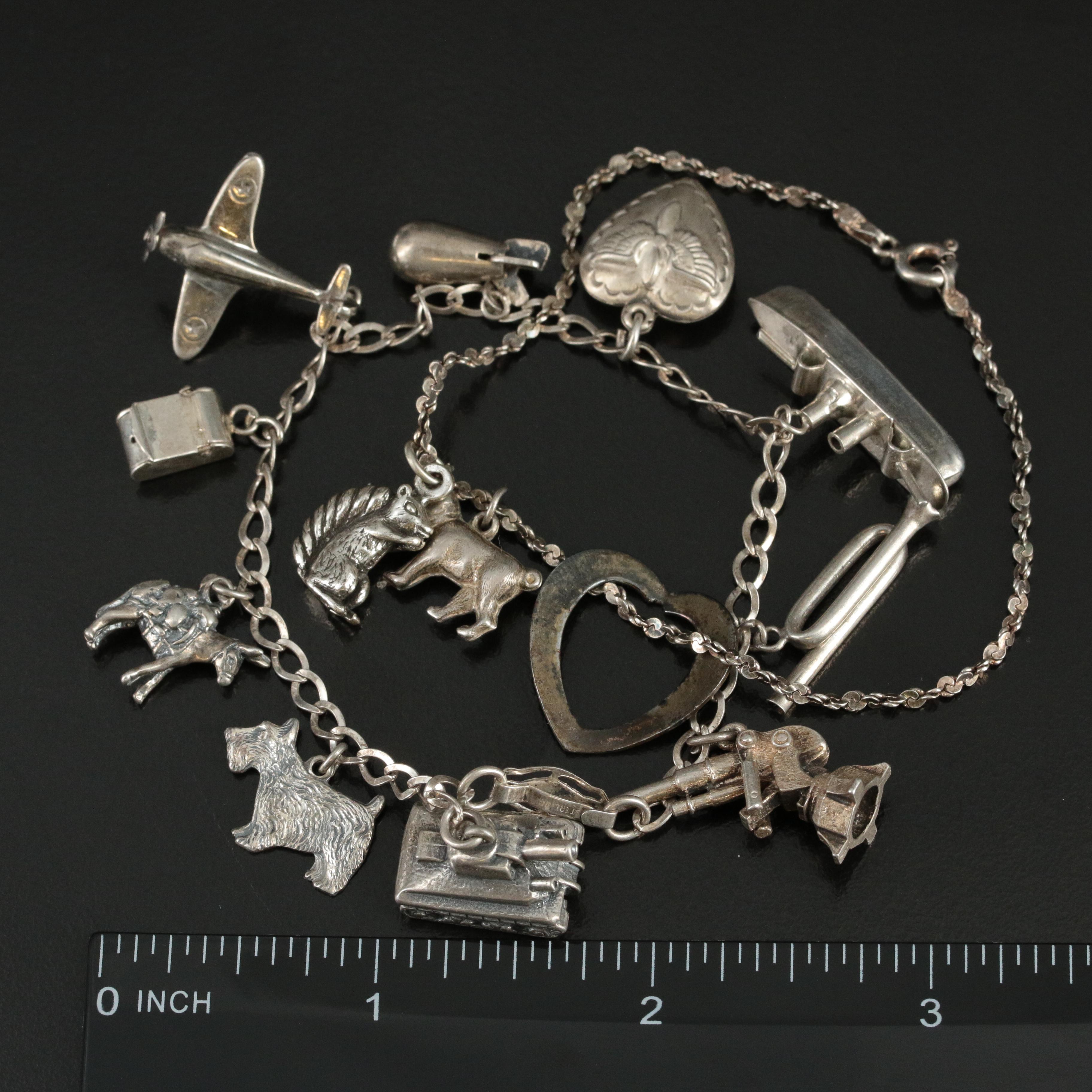 Vintage Sterling Charm Bracelets Including Military and Animal Themed