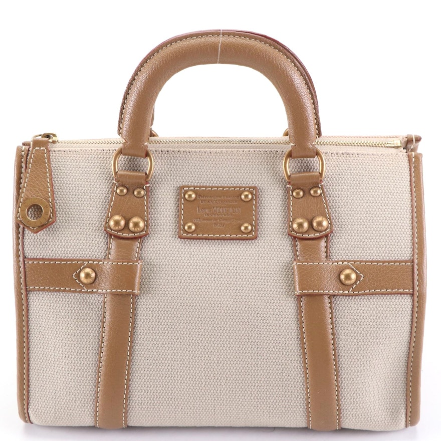 Louis Quatorze Authenticated Leather Handbag