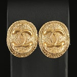 1970s Chanel Textured Oval Logo Clip Earrings